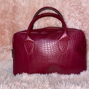 Red leather handbag